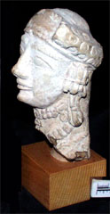 Terracotta head of woman wearing jewellery; Gift of L. Bowen (AN1926.551)